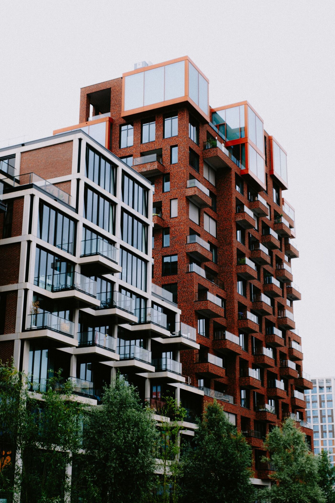 Terraced façade of timber and planted balconies