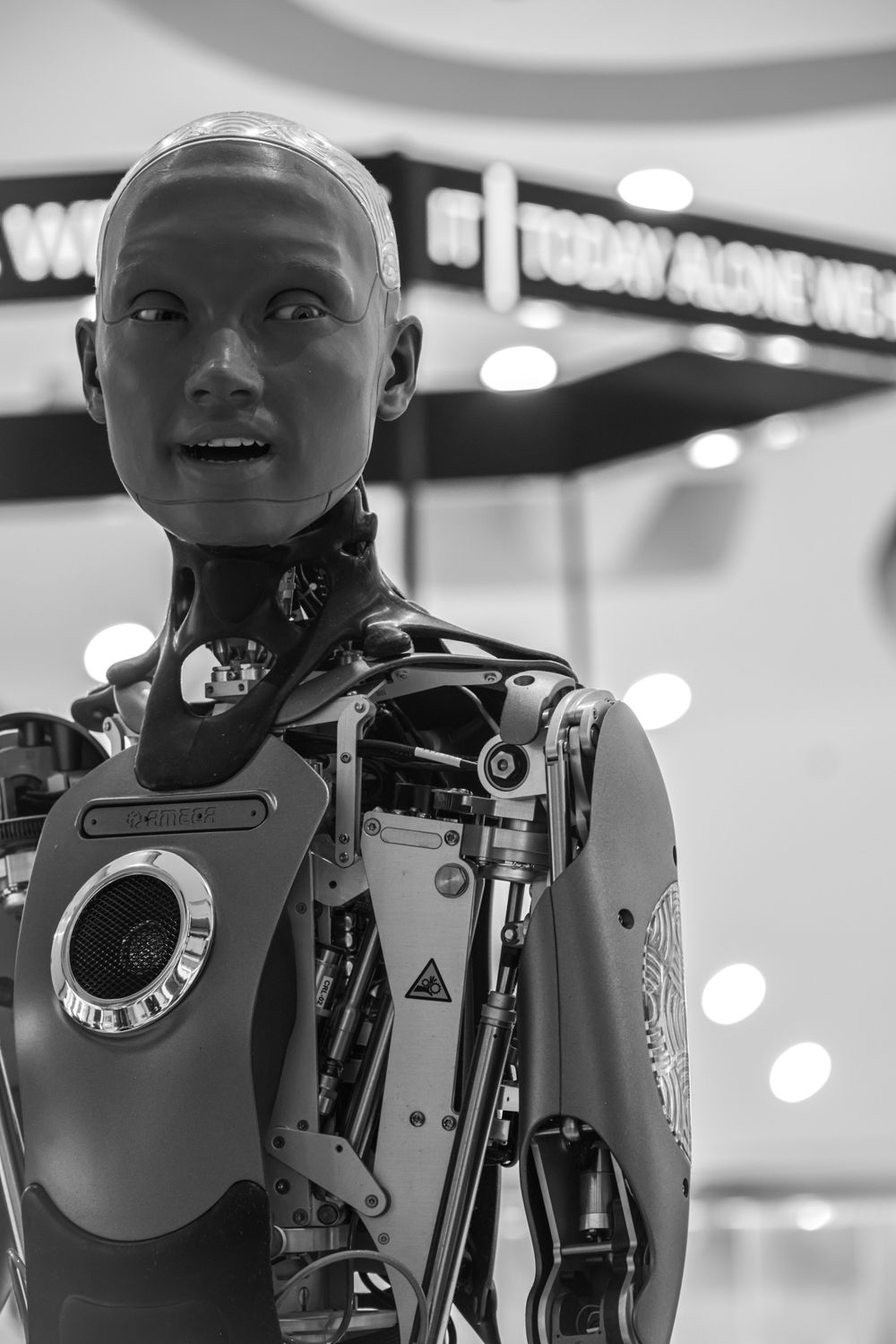 Mechanical parts of a robot in black and white