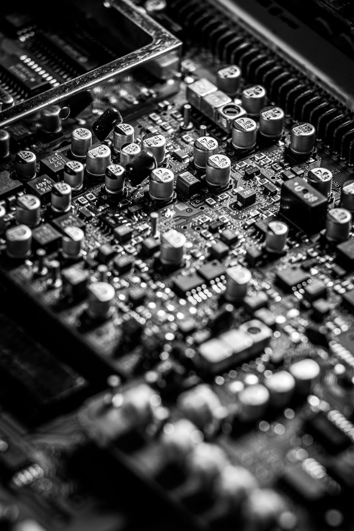 Black-and-white macro of a populated circuit board